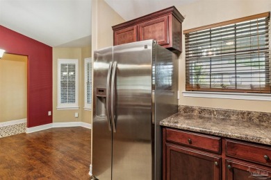 You'll blend with nature in this all brick, 3-bedroom, 2-bath on The Club At Hidden Creek in Florida - for sale on GolfHomes.com, golf home, golf lot