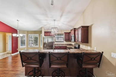You'll blend with nature in this all brick, 3-bedroom, 2-bath on The Club At Hidden Creek in Florida - for sale on GolfHomes.com, golf home, golf lot