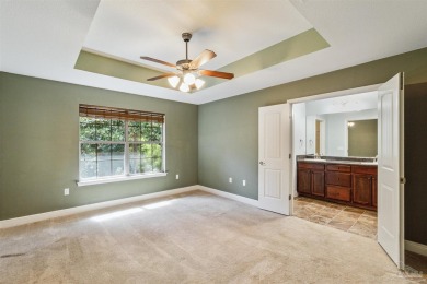 You'll blend with nature in this all brick, 3-bedroom, 2-bath on The Club At Hidden Creek in Florida - for sale on GolfHomes.com, golf home, golf lot
