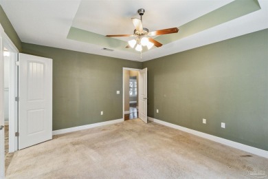 You'll blend with nature in this all brick, 3-bedroom, 2-bath on The Club At Hidden Creek in Florida - for sale on GolfHomes.com, golf home, golf lot