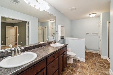 You'll blend with nature in this all brick, 3-bedroom, 2-bath on The Club At Hidden Creek in Florida - for sale on GolfHomes.com, golf home, golf lot