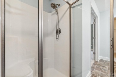 You'll blend with nature in this all brick, 3-bedroom, 2-bath on The Club At Hidden Creek in Florida - for sale on GolfHomes.com, golf home, golf lot