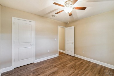 You'll blend with nature in this all brick, 3-bedroom, 2-bath on The Club At Hidden Creek in Florida - for sale on GolfHomes.com, golf home, golf lot