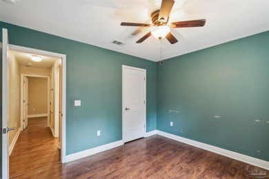 You'll blend with nature in this all brick, 3-bedroom, 2-bath on The Club At Hidden Creek in Florida - for sale on GolfHomes.com, golf home, golf lot
