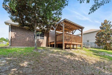 You'll blend with nature in this all brick, 3-bedroom, 2-bath on The Club At Hidden Creek in Florida - for sale on GolfHomes.com, golf home, golf lot