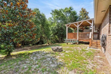 You'll blend with nature in this all brick, 3-bedroom, 2-bath on The Club At Hidden Creek in Florida - for sale on GolfHomes.com, golf home, golf lot
