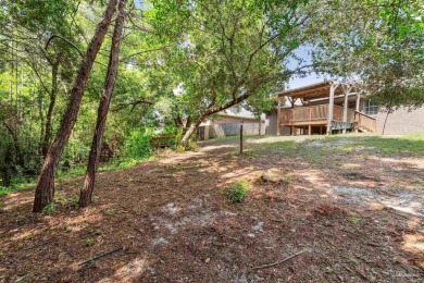 You'll blend with nature in this all brick, 3-bedroom, 2-bath on The Club At Hidden Creek in Florida - for sale on GolfHomes.com, golf home, golf lot