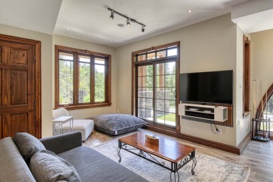 Acces to Lake Ouimet! The home greets you with its beautifully on Le Diable Golf Course in  - for sale on GolfHomes.com, golf home, golf lot