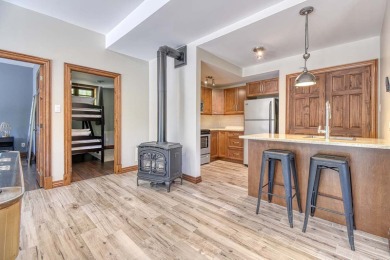 Acces to Lake Ouimet! The home greets you with its beautifully on Le Diable Golf Course in  - for sale on GolfHomes.com, golf home, golf lot