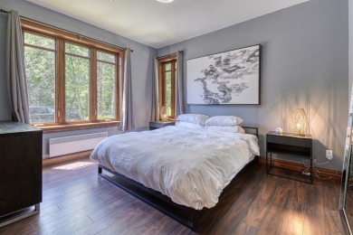 Acces to Lake Ouimet! The home greets you with its beautifully on Le Diable Golf Course in  - for sale on GolfHomes.com, golf home, golf lot