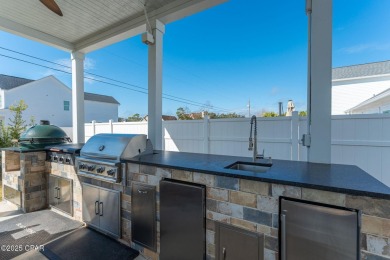 FULLY FURNISHED TURNKEY HOME WITH RELAXING COVERED OUTDOOR SPACE on Sharks Tooth Golf Club in Florida - for sale on GolfHomes.com, golf home, golf lot