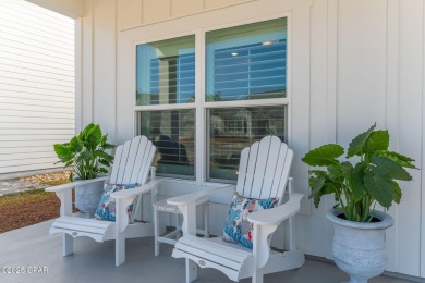 FULLY FURNISHED TURNKEY HOME WITH RELAXING COVERED OUTDOOR SPACE on Sharks Tooth Golf Club in Florida - for sale on GolfHomes.com, golf home, golf lot