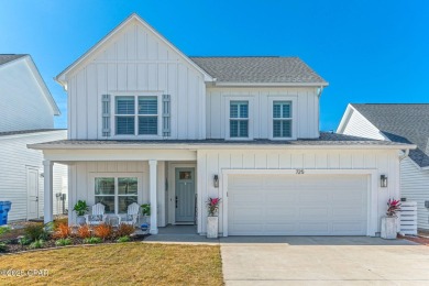 FULLY FURNISHED TURNKEY HOME WITH RELAXING COVERED OUTDOOR SPACE on Sharks Tooth Golf Club in Florida - for sale on GolfHomes.com, golf home, golf lot
