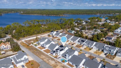 FULLY FURNISHED TURNKEY HOME WITH RELAXING COVERED OUTDOOR SPACE on Sharks Tooth Golf Club in Florida - for sale on GolfHomes.com, golf home, golf lot