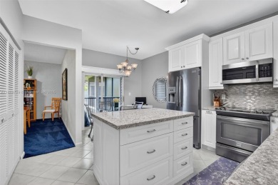 Lovely 2 bedroom, 2 bath Cayman model on the second floor on Boca Pointe Country Club in Florida - for sale on GolfHomes.com, golf home, golf lot