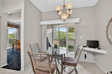 Lovely 2 bedroom, 2 bath Cayman model on the second floor on Boca Pointe Country Club in Florida - for sale on GolfHomes.com, golf home, golf lot