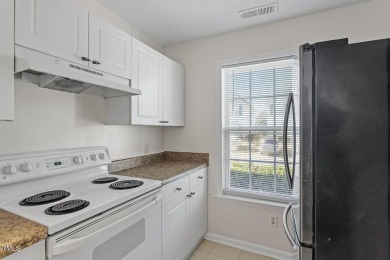 Welcome to this beautifully updated 2 bedroom end-unit home in a on Hedingham Golf and Athletic Club in North Carolina - for sale on GolfHomes.com, golf home, golf lot