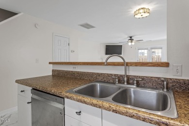 Welcome to this beautifully updated 2 bedroom end-unit home in a on Hedingham Golf and Athletic Club in North Carolina - for sale on GolfHomes.com, golf home, golf lot