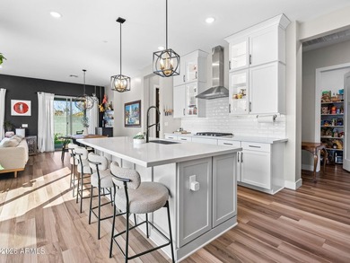 Private secure and easy living nestled by the beautiful Palm on Palm Valley Golf Club  in Arizona - for sale on GolfHomes.com, golf home, golf lot