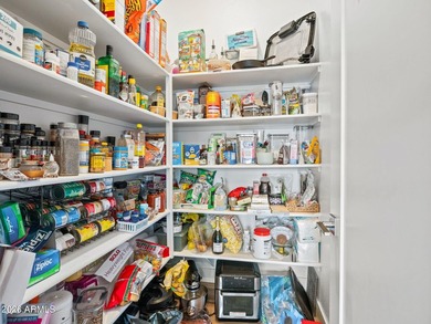 Private secure and easy living nestled by the beautiful Palm on Palm Valley Golf Club  in Arizona - for sale on GolfHomes.com, golf home, golf lot