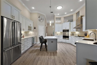 Welcome to this exceptional, upgraded and move-in ready on The Links of Spruce Creek in Florida - for sale on GolfHomes.com, golf home, golf lot
