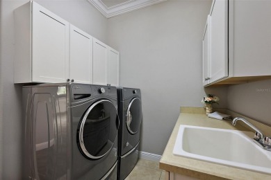 Welcome to this exceptional, upgraded and move-in ready on The Links of Spruce Creek in Florida - for sale on GolfHomes.com, golf home, golf lot