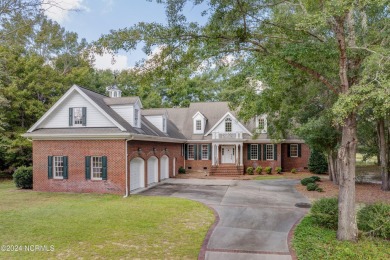 Welcome to your dream home in the elegant River Landing gated on River Landing Golf Course in North Carolina - for sale on GolfHomes.com, golf home, golf lot