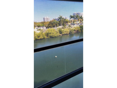 Enjoy the wrap-around screened balcony with amazing Marina and on Turnberry Isle Resort and Club in Florida - for sale on GolfHomes.com, golf home, golf lot