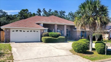 All brick exterior home with circular driveway and privacy on The Club At Hidden Creek in Florida - for sale on GolfHomes.com, golf home, golf lot