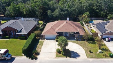 All brick exterior home with circular driveway and privacy on The Club At Hidden Creek in Florida - for sale on GolfHomes.com, golf home, golf lot