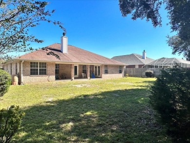 All brick exterior home with circular driveway and privacy on The Club At Hidden Creek in Florida - for sale on GolfHomes.com, golf home, golf lot