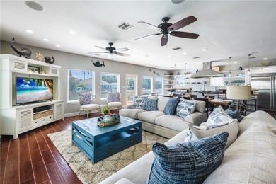 Stunning Waterfront Home on the Desirable Shady Side of Island on Palmilla Beach Golf Club in Texas - for sale on GolfHomes.com, golf home, golf lot