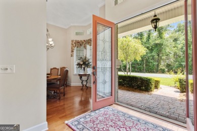 Step into a world of elegance and comfort with this timeless on Laurel Island Links in Georgia - for sale on GolfHomes.com, golf home, golf lot