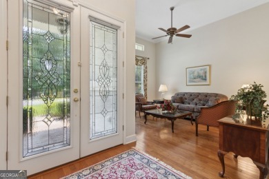 Step into a world of elegance and comfort with this timeless on Laurel Island Links in Georgia - for sale on GolfHomes.com, golf home, golf lot