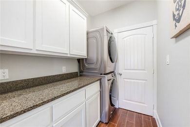 Stunning Waterfront Home on the Desirable Shady Side of Island on Palmilla Beach Golf Club in Texas - for sale on GolfHomes.com, golf home, golf lot