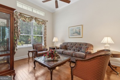 Step into a world of elegance and comfort with this timeless on Laurel Island Links in Georgia - for sale on GolfHomes.com, golf home, golf lot