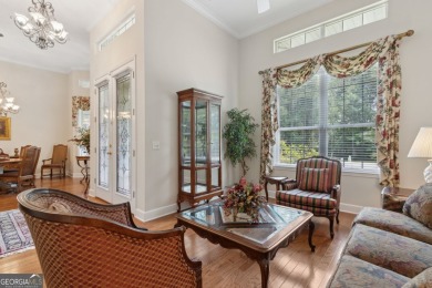 Step into a world of elegance and comfort with this timeless on Laurel Island Links in Georgia - for sale on GolfHomes.com, golf home, golf lot