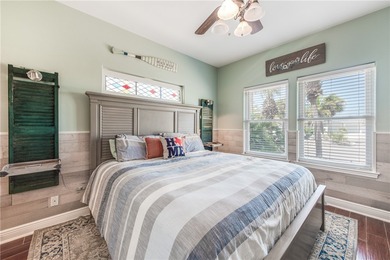 Stunning Waterfront Home on the Desirable Shady Side of Island on Palmilla Beach Golf Club in Texas - for sale on GolfHomes.com, golf home, golf lot