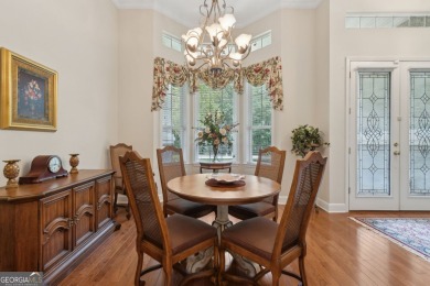 Step into a world of elegance and comfort with this timeless on Laurel Island Links in Georgia - for sale on GolfHomes.com, golf home, golf lot