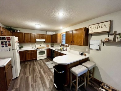 This 2 plus bedroom, 1.75 bath ranch townhome is the perfect on Elk Point Country Club in South Dakota - for sale on GolfHomes.com, golf home, golf lot