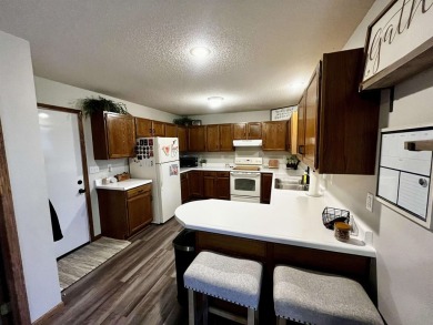 This 2 plus bedroom, 1.75 bath ranch townhome is the perfect on Elk Point Country Club in South Dakota - for sale on GolfHomes.com, golf home, golf lot