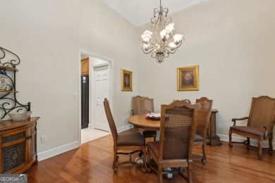 Step into a world of elegance and comfort with this timeless on Laurel Island Links in Georgia - for sale on GolfHomes.com, golf home, golf lot