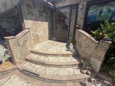 This well-cared for Palm Harbor home is being sold fully on Del Tura Golf and Country Club in Florida - for sale on GolfHomes.com, golf home, golf lot