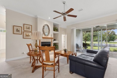 Step into a world of elegance and comfort with this timeless on Laurel Island Links in Georgia - for sale on GolfHomes.com, golf home, golf lot