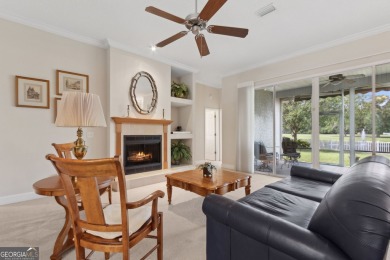 Step into a world of elegance and comfort with this timeless on Laurel Island Links in Georgia - for sale on GolfHomes.com, golf home, golf lot