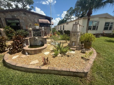This well-cared for Palm Harbor home is being sold fully on Del Tura Golf and Country Club in Florida - for sale on GolfHomes.com, golf home, golf lot