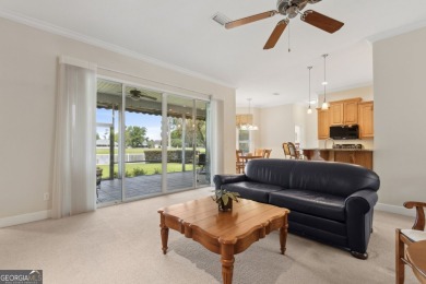 Step into a world of elegance and comfort with this timeless on Laurel Island Links in Georgia - for sale on GolfHomes.com, golf home, golf lot