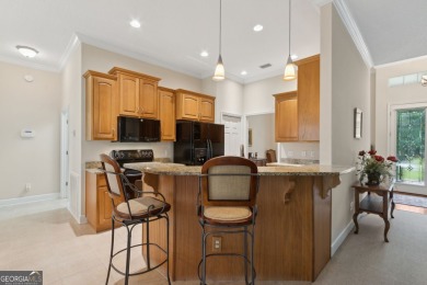 Step into a world of elegance and comfort with this timeless on Laurel Island Links in Georgia - for sale on GolfHomes.com, golf home, golf lot