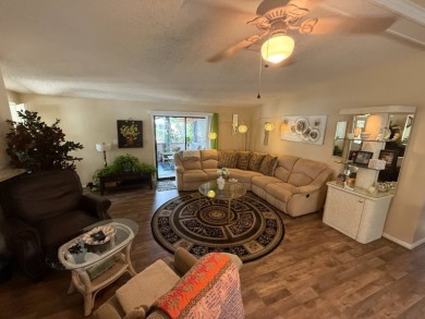 This well-cared for Palm Harbor home is being sold fully on Del Tura Golf and Country Club in Florida - for sale on GolfHomes.com, golf home, golf lot