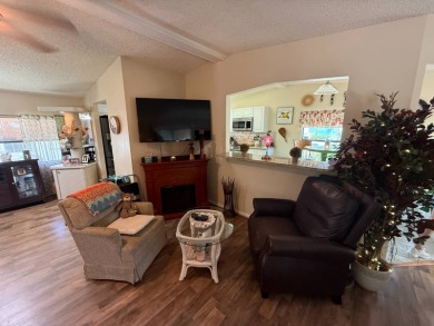 This well-cared for Palm Harbor home is being sold fully on Del Tura Golf and Country Club in Florida - for sale on GolfHomes.com, golf home, golf lot